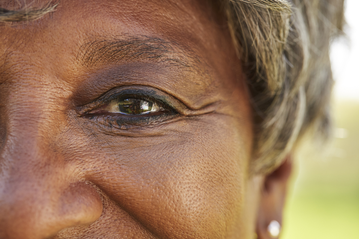 close up photo of African American senior woman's eye