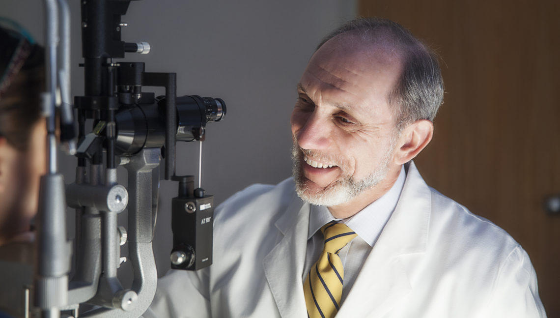 Ophthalmologist performing an eye exam