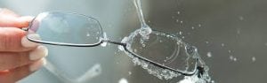 eyeglasses under a stream of water