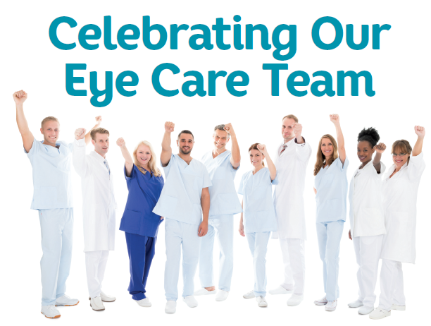 ophthalmic technicians dressed in scrubs with arms raised in celebration