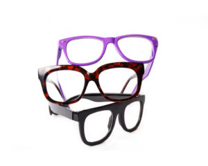 three pairs of eye glasses