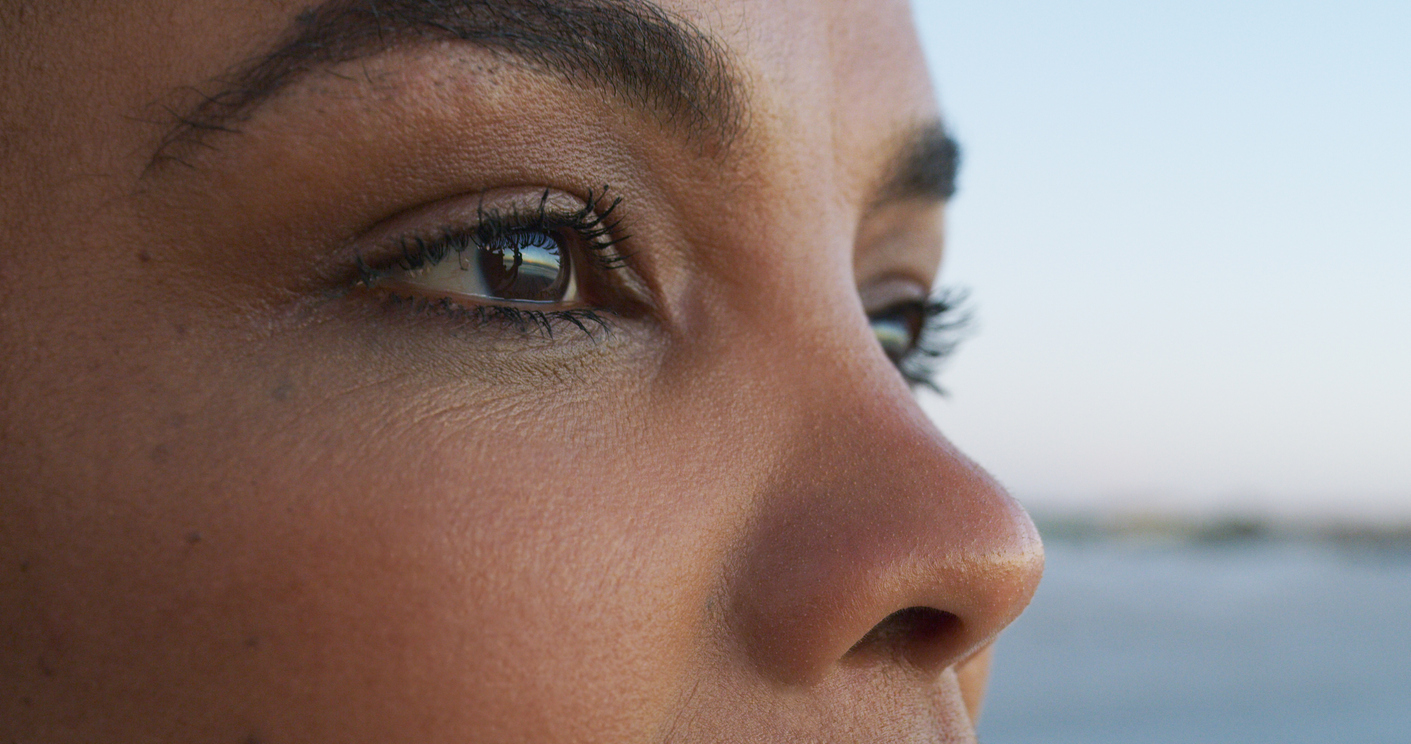 Closeup shot of an attractive young woman gazing